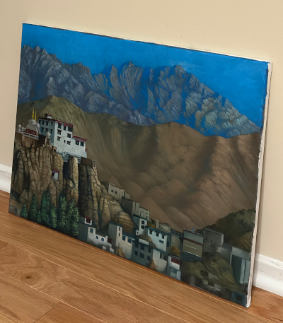 A three-quarters turned view of the physical painting.