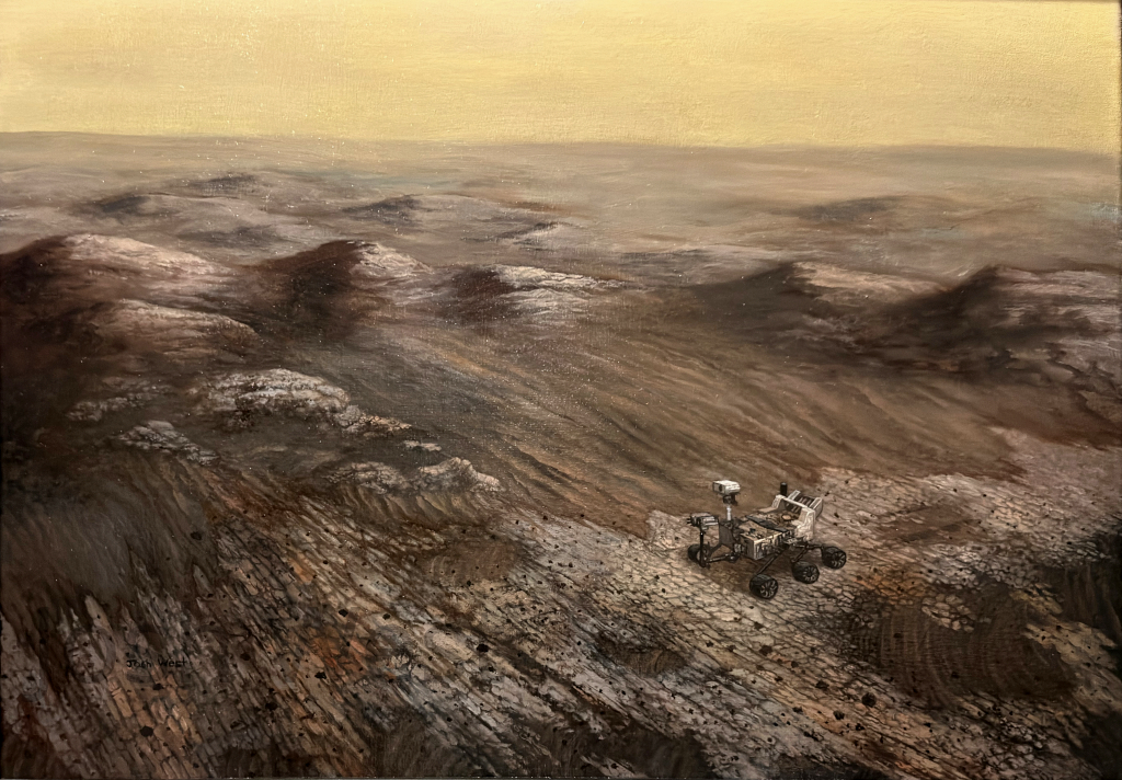 A high angle view of the surface of Mars with rocks and windblown dust mounds. Among this scene is the robot explorer, Perseverance, the rover sent to Mars by NASA in 2020
