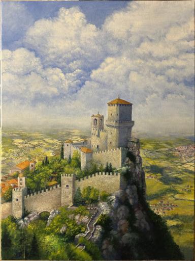 A single tower of an old stone fortress high atop a mountain in the republic of San Marino, known as Guaita Tower