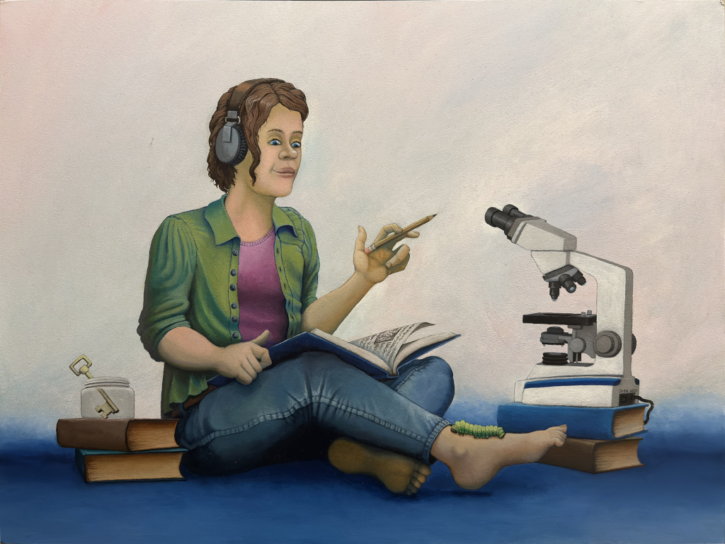Woman seated on the floor with open book in lap, staring down at a caterpillar crawling on her bare foot, just calmly studying it. There is also a microscope next to her and a stack of books with a glass jar and a single metal key in the jar.